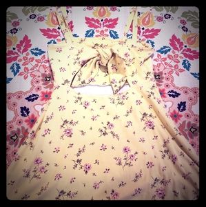 Yellow Sundress with pink flowers